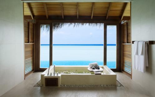 Anantara Dhigu Maldives Resort-Sunset Over Water Suite bath with decoration_5133