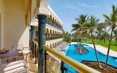 Al-Bustan-Palace-Ritz-Carlton-Deluxe-Pool-View-King-Room-Balcony