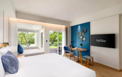 SAii Laguna Phuket Lagoon View Terrace King Bed Bed Table View
