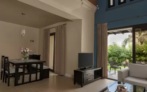 middle-east-holidays-ras-al-khaimah-the-cove-rotana-resort-garden view-one-bedroom-villa-living-room-and-Dining