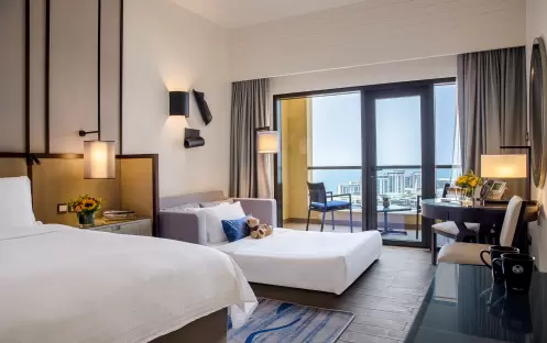 middle-east-holidays-dubai-amwaj-rotana-jumeirah-beach—sea-front-view-family-room-with-balcony