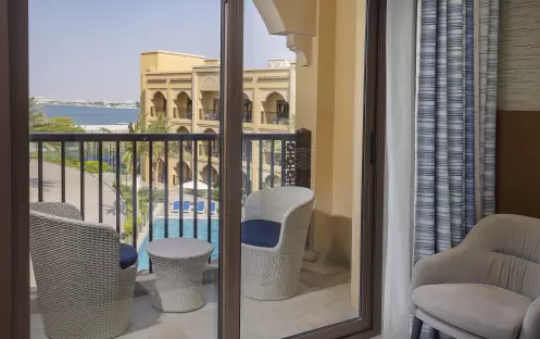 middle-east-holidays-ras-al-khaimah-doubletree-by-hilton-resort-spa-marjan-island-hotel-guest-room-with-pool-view