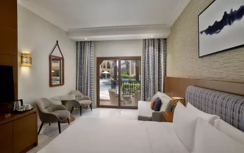 middle-east-holidays-ras-al-khaimah-doubletree-by-hilton-resort-spa-marjan-island-hotel-guest-room-with-pool-view