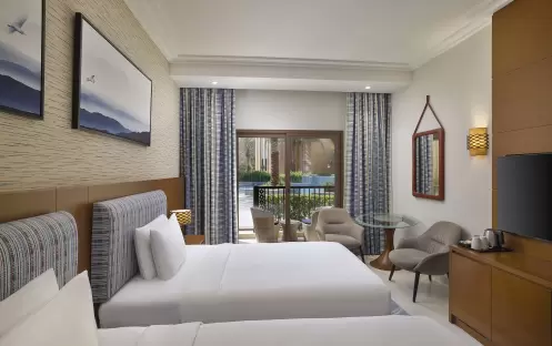 middle-east-holidays-ras-al-khaimah-doubletree-by-hilton-resort-spa-marjan-island-hotel-guest-room-with-pool-view