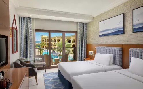 middle-east-holidays-ras-al-khaimah-doubletree-by-hilton-resort-spa-marjan-island-hotel-guest-room-with-pool-view